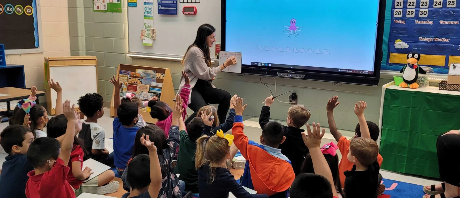 Kids in classroom engaged in puzzle talks
